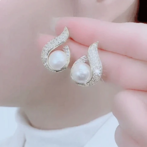 Elegant simulated pearl and rhinestone earrings